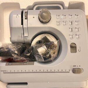 Compact Sewing Machine in Light Gray